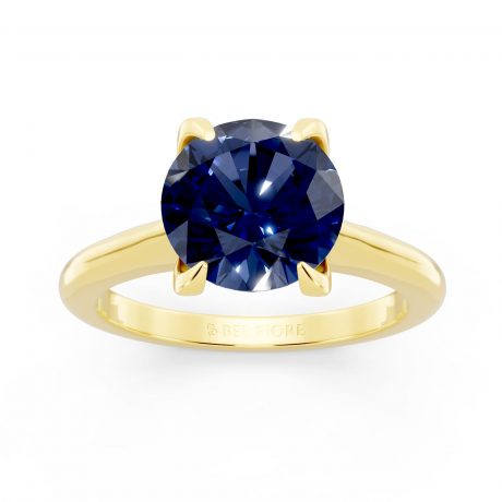 Deep blue round cut sapphire- Yellow Gold