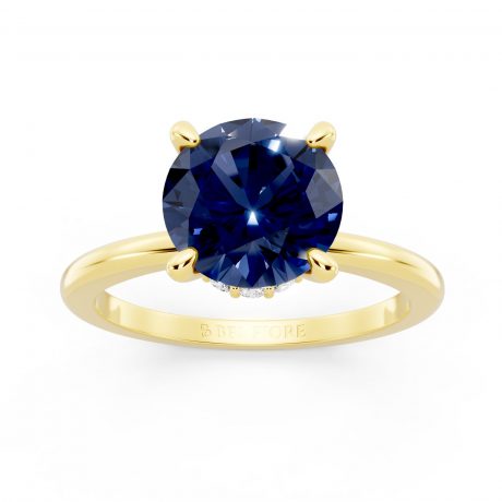 Deep blue round-cut sapphire -Yellow Gold