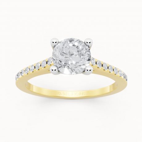 Round cut center stone gracefully accented -White Head
