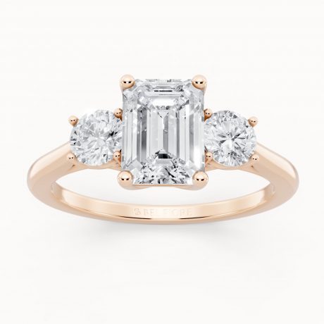 Emerald cut center with two round side stones -Rose Gold