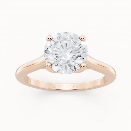 Brilliant round cut center diamond in classic prongs- Rose Gold