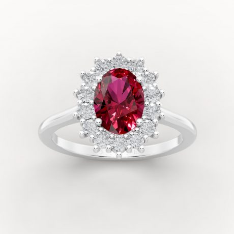 Oval cut ruby radiates encircled by halo diamonds - White Gold