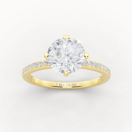 Brilliant round center diamond, pavé set stones- Yellow Gold