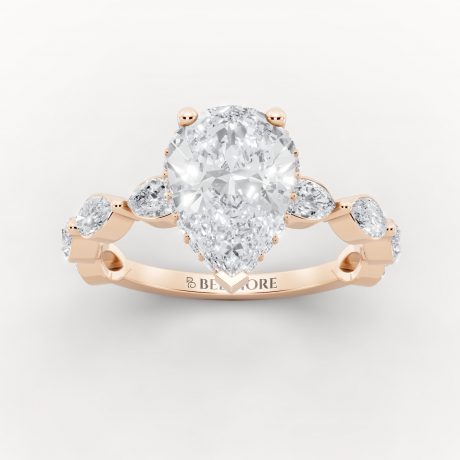 Brilliant center stone with marquise inspired side diamonds -Rose Gold