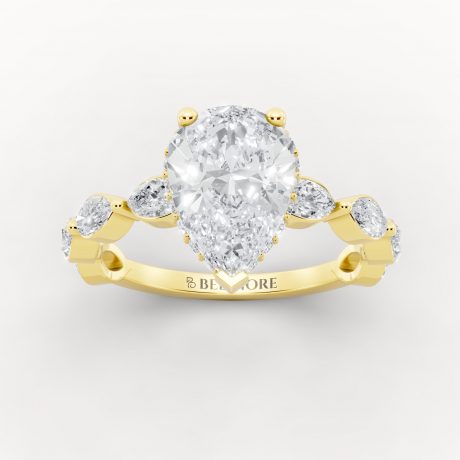Brilliant center stone with marquise inspired side diamonds -Yellow Gold