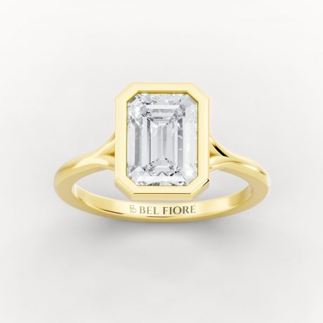 Bezel set emerald cut diamond -Yellow Gold
