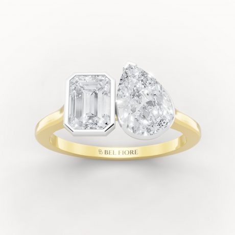 Emerald cut diamond paired with a pear shaped diamond- White Head