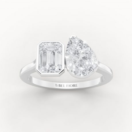 Emerald cut diamond paired with a pear shaped diamond- White Gold